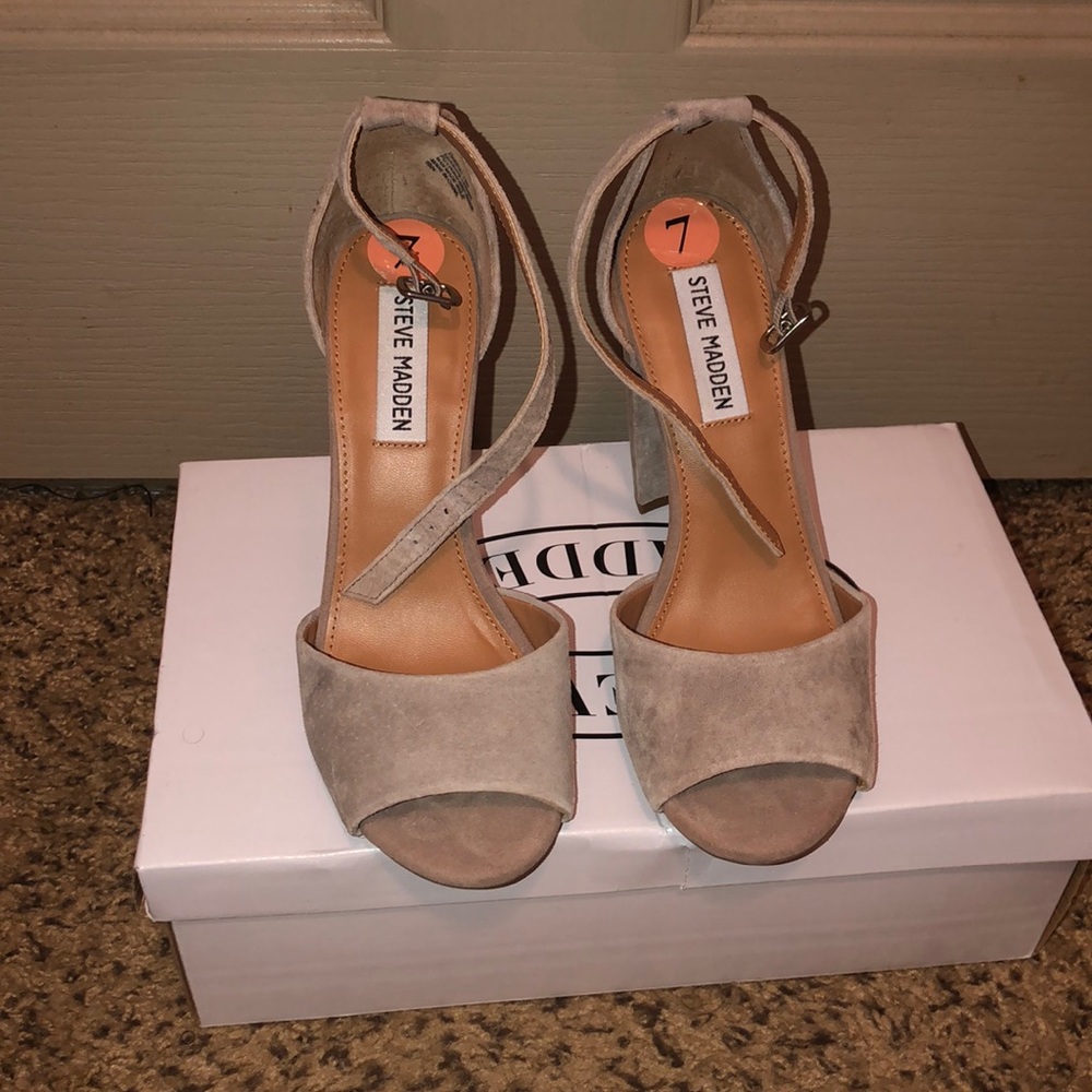 Steve Madden tan sandal.